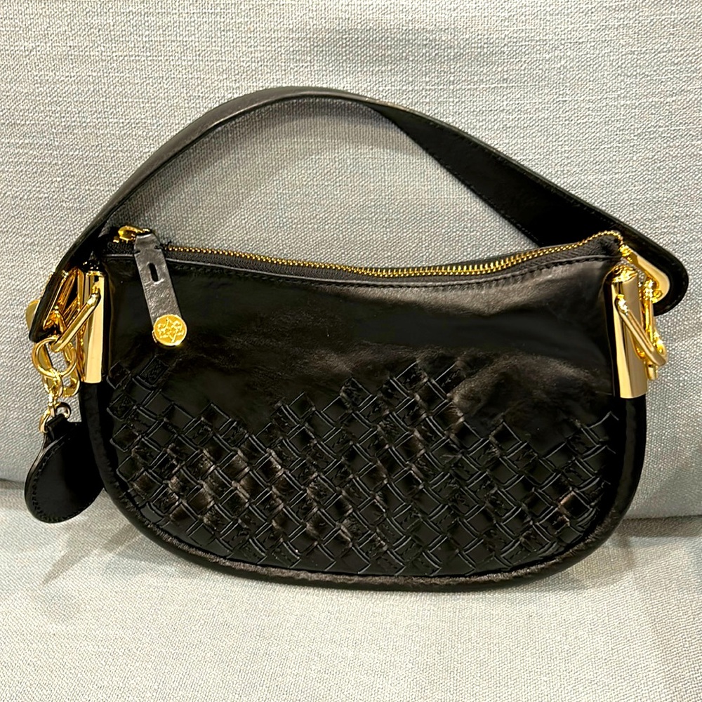Black handbag with gold fittings